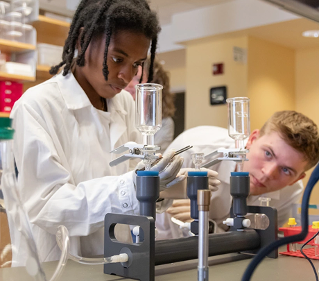 two young men working in a lab